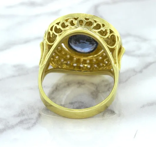 4.23ct Oval Blue Spinel Ring with Double Diamond Halo in 14K Yellow Gold