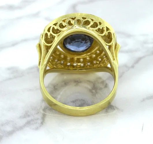4.23ct Oval Blue Spinel Ring with Double Diamond Halo in 14K Yellow Gold