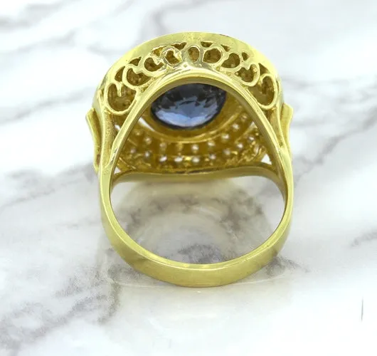 4.23ct Oval Blue Spinel Ring with Double Diamond Halo in 14K Yellow Gold