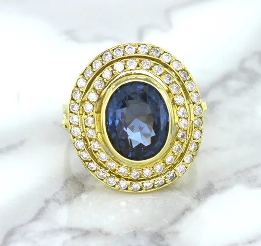 4.23ct Oval Blue Spinel Ring with Double Diamond Halo in 14K Yellow Gold