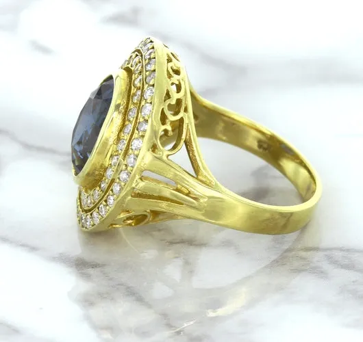 4.23ct Oval Blue Spinel Ring with Double Diamond Halo in 14K Yellow Gold