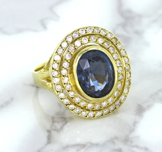 4.23ct Oval Blue Spinel Ring with Double Diamond Halo in 14K Yellow Gold