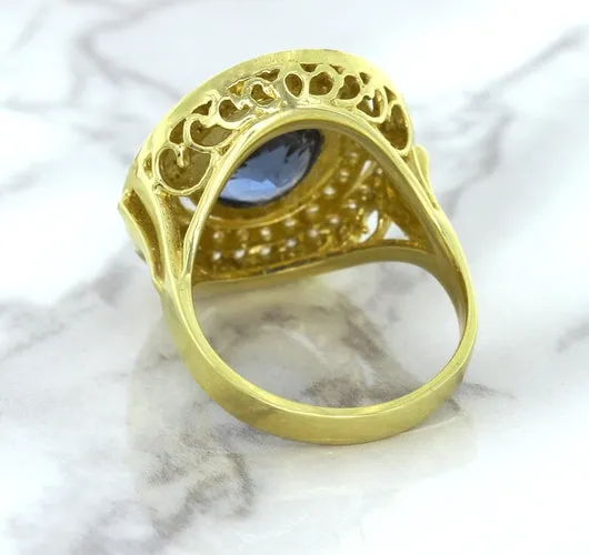 4.23ct Oval Blue Spinel Ring with Double Diamond Halo in 14K Yellow Gold