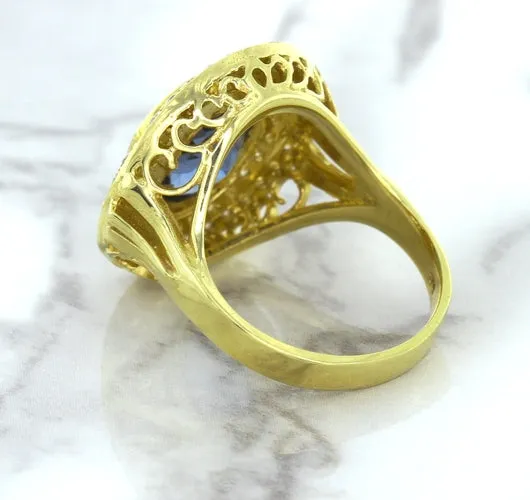 4.23ct Oval Blue Spinel Ring with Double Diamond Halo in 14K Yellow Gold