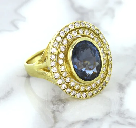 4.23ct Oval Blue Spinel Ring with Double Diamond Halo in 14K Yellow Gold