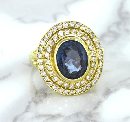 4.23ct Oval Blue Spinel Ring with Double Diamond Halo in 14K Yellow Gold