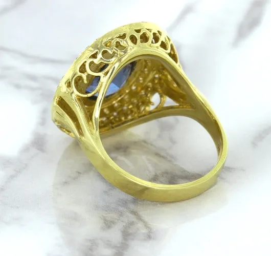 4.23ct Oval Blue Spinel Ring with Double Diamond Halo in 14K Yellow Gold