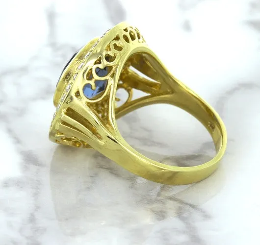 4.23ct Oval Blue Spinel Ring with Double Diamond Halo in 14K Yellow Gold