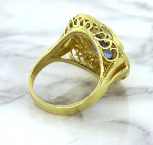 4.23ct Oval Blue Spinel Ring with Double Diamond Halo in 14K Yellow Gold