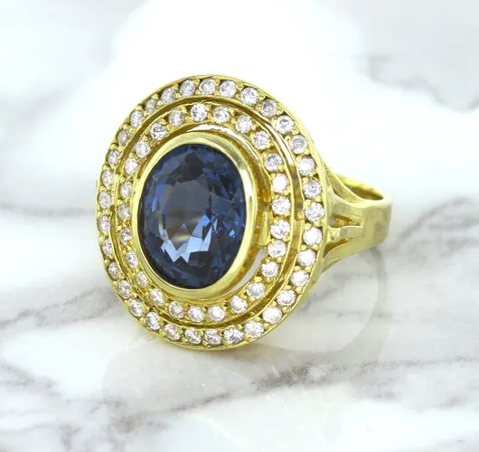 4.23ct Oval Blue Spinel Ring with Double Diamond Halo in 14K Yellow Gold