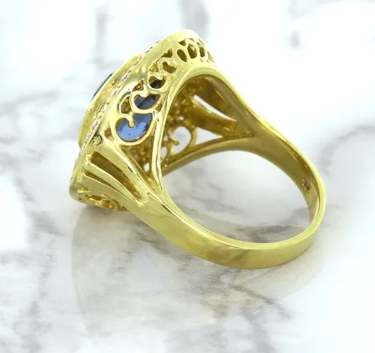 4.23ct Oval Blue Spinel Ring with Double Diamond Halo in 14K Yellow Gold