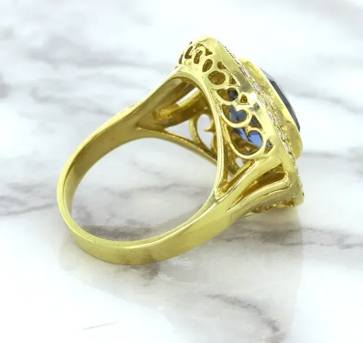4.23ct Oval Blue Spinel Ring with Double Diamond Halo in 14K Yellow Gold