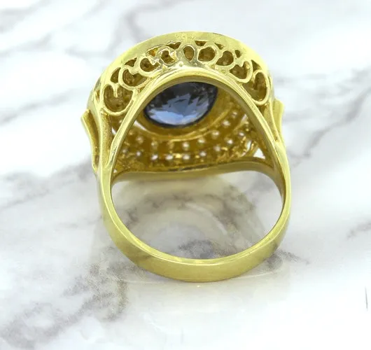 4.23ct Oval Blue Spinel Ring with Double Diamond Halo in 14K Yellow Gold
