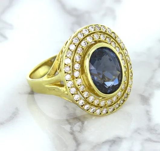 4.23ct Oval Blue Spinel Ring with Double Diamond Halo in 14K Yellow Gold