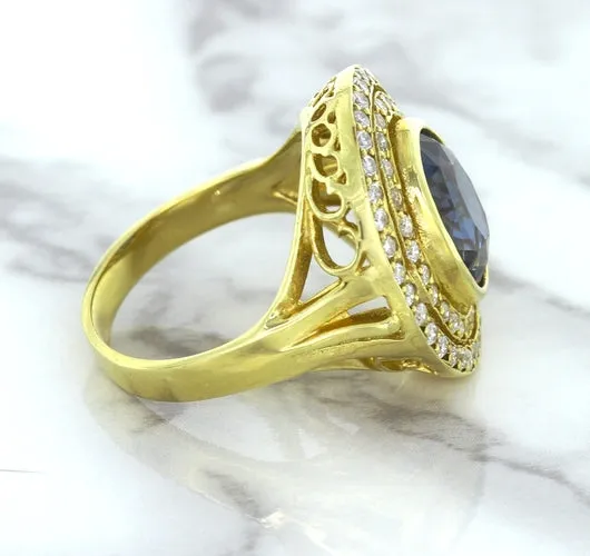4.23ct Oval Blue Spinel Ring with Double Diamond Halo in 14K Yellow Gold