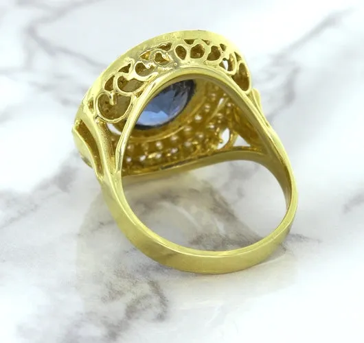4.23ct Oval Blue Spinel Ring with Double Diamond Halo in 14K Yellow Gold
