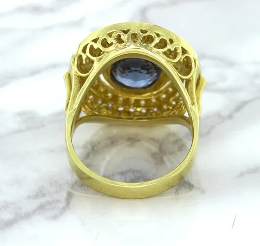 4.23ct Oval Blue Spinel Ring with Double Diamond Halo in 14K Yellow Gold