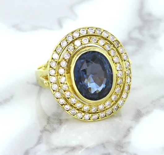 4.23ct Oval Blue Spinel Ring with Double Diamond Halo in 14K Yellow Gold
