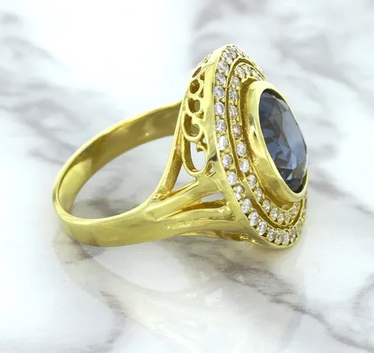 4.23ct Oval Blue Spinel Ring with Double Diamond Halo in 14K Yellow Gold
