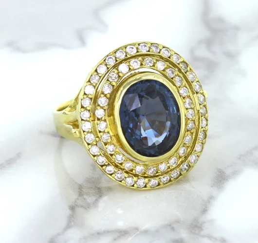 4.23ct Oval Blue Spinel Ring with Double Diamond Halo in 14K Yellow Gold