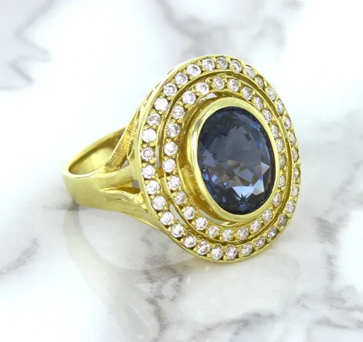 4.23ct Oval Blue Spinel Ring with Double Diamond Halo in 14K Yellow Gold
