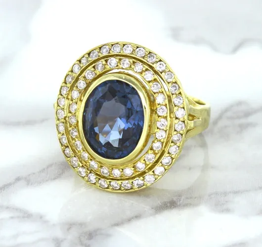 4.23ct Oval Blue Spinel Ring with Double Diamond Halo in 14K Yellow Gold
