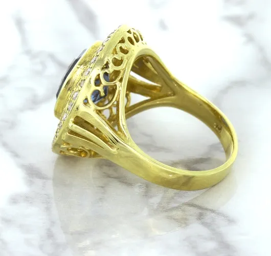 4.23ct Oval Blue Spinel Ring with Double Diamond Halo in 14K Yellow Gold