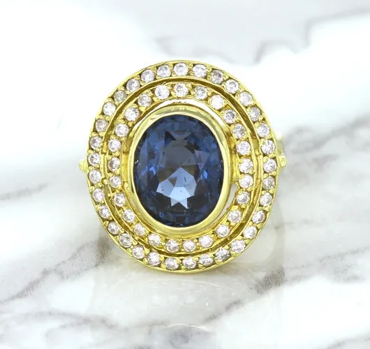 4.23ct Oval Blue Spinel Ring with Double Diamond Halo in 14K Yellow Gold