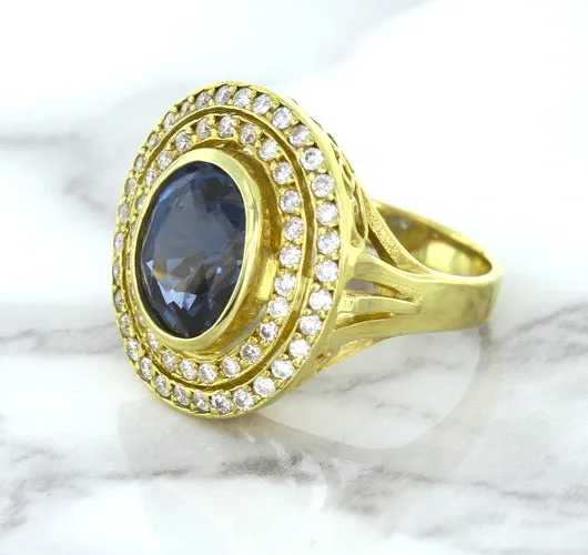 4.23ct Oval Blue Spinel Ring with Double Diamond Halo in 14K Yellow Gold