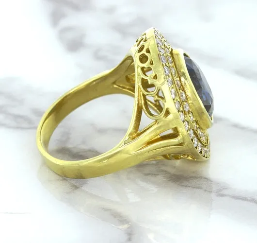4.23ct Oval Blue Spinel Ring with Double Diamond Halo in 14K Yellow Gold