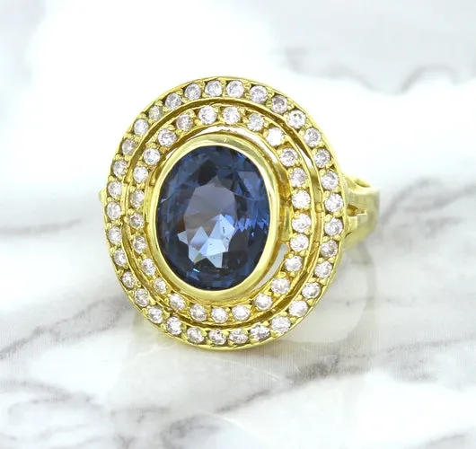 4.23ct Oval Blue Spinel Ring with Double Diamond Halo in 14K Yellow Gold