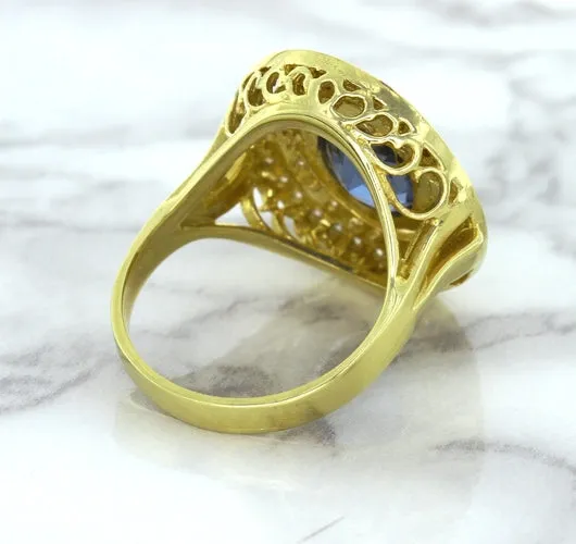 4.23ct Oval Blue Spinel Ring with Double Diamond Halo in 14K Yellow Gold