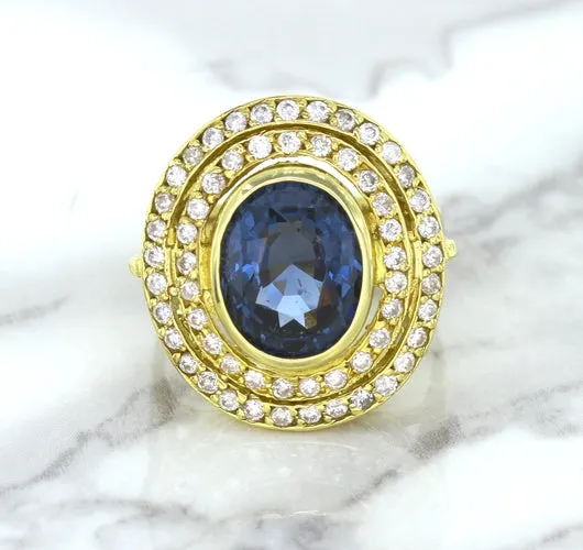 4.23ct Oval Blue Spinel Ring with Double Diamond Halo in 14K Yellow Gold