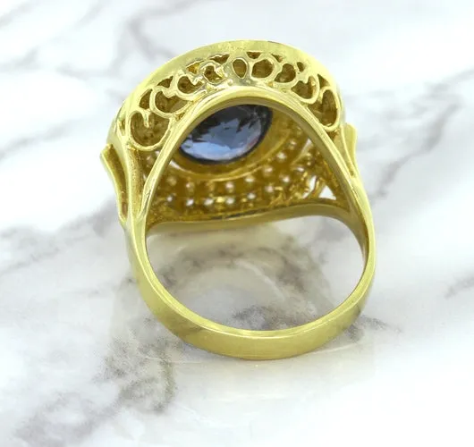 4.23ct Oval Blue Spinel Ring with Double Diamond Halo in 14K Yellow Gold
