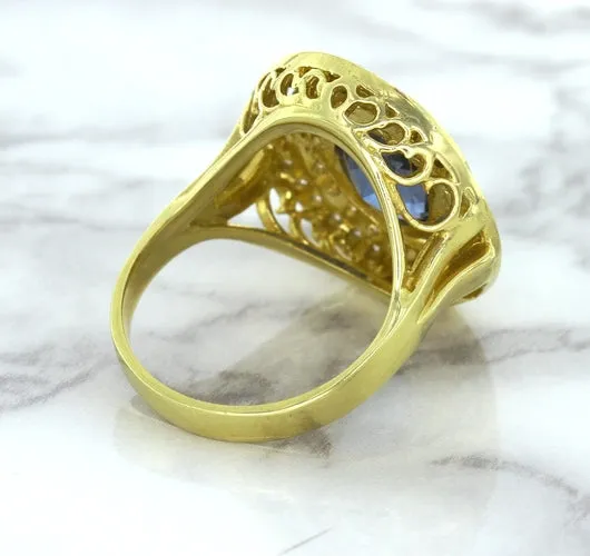 4.23ct Oval Blue Spinel Ring with Double Diamond Halo in 14K Yellow Gold