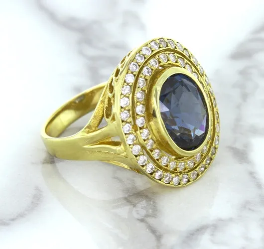 4.23ct Oval Blue Spinel Ring with Double Diamond Halo in 14K Yellow Gold