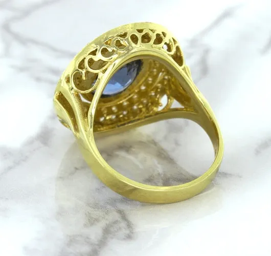4.23ct Oval Blue Spinel Ring with Double Diamond Halo in 14K Yellow Gold