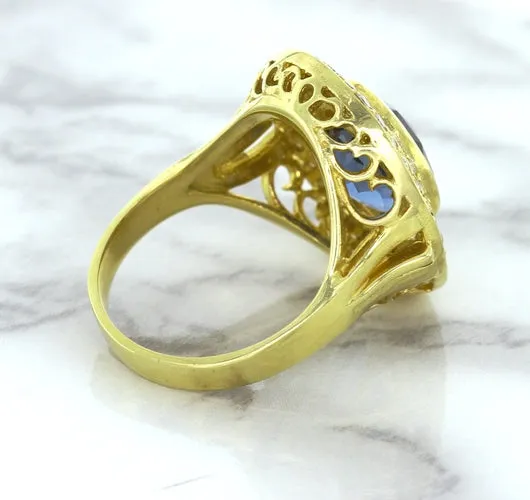4.23ct Oval Blue Spinel Ring with Double Diamond Halo in 14K Yellow Gold