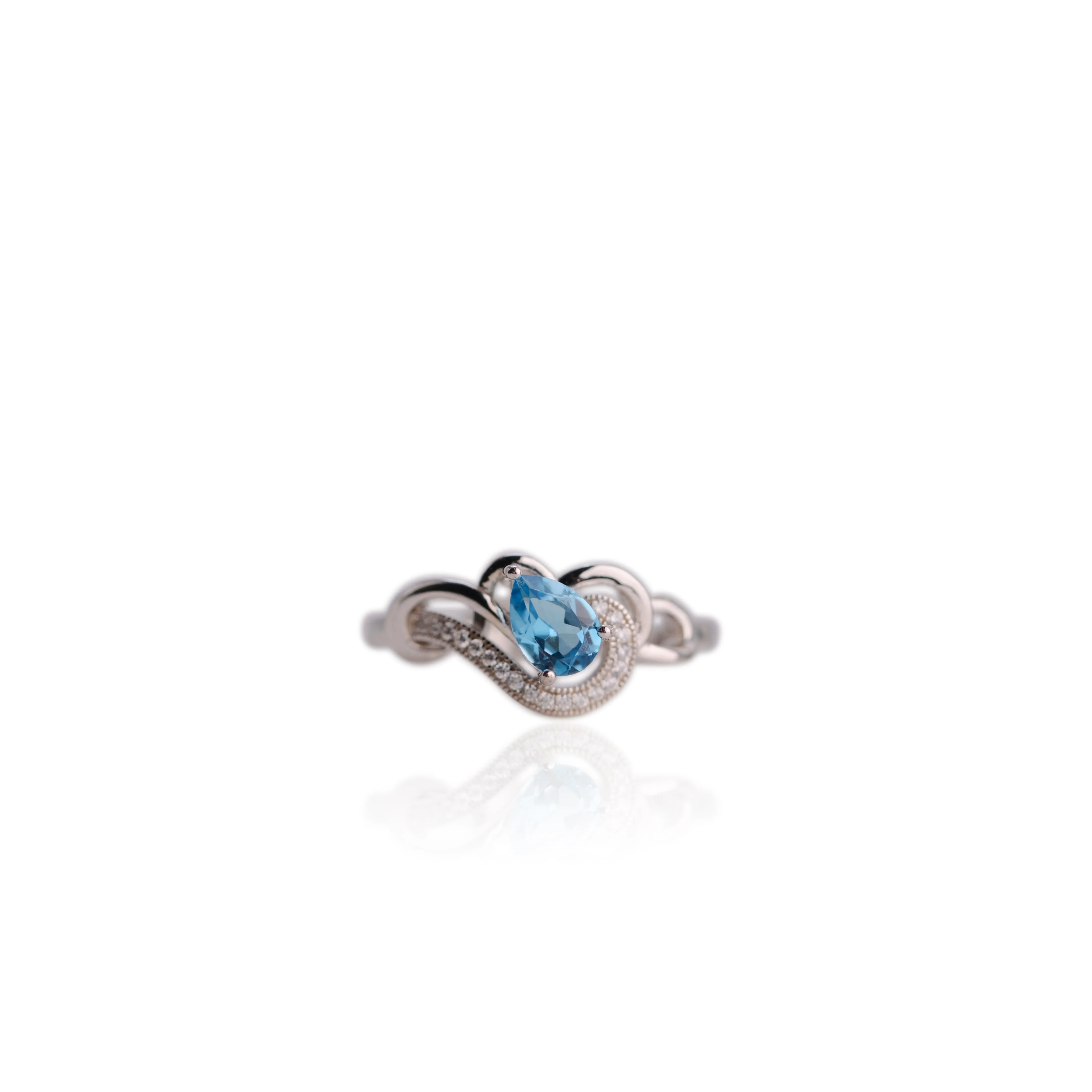 5 x 7 mm. Pear Cut Sky Blue Brazilian Topaz with Cz Accents Ring