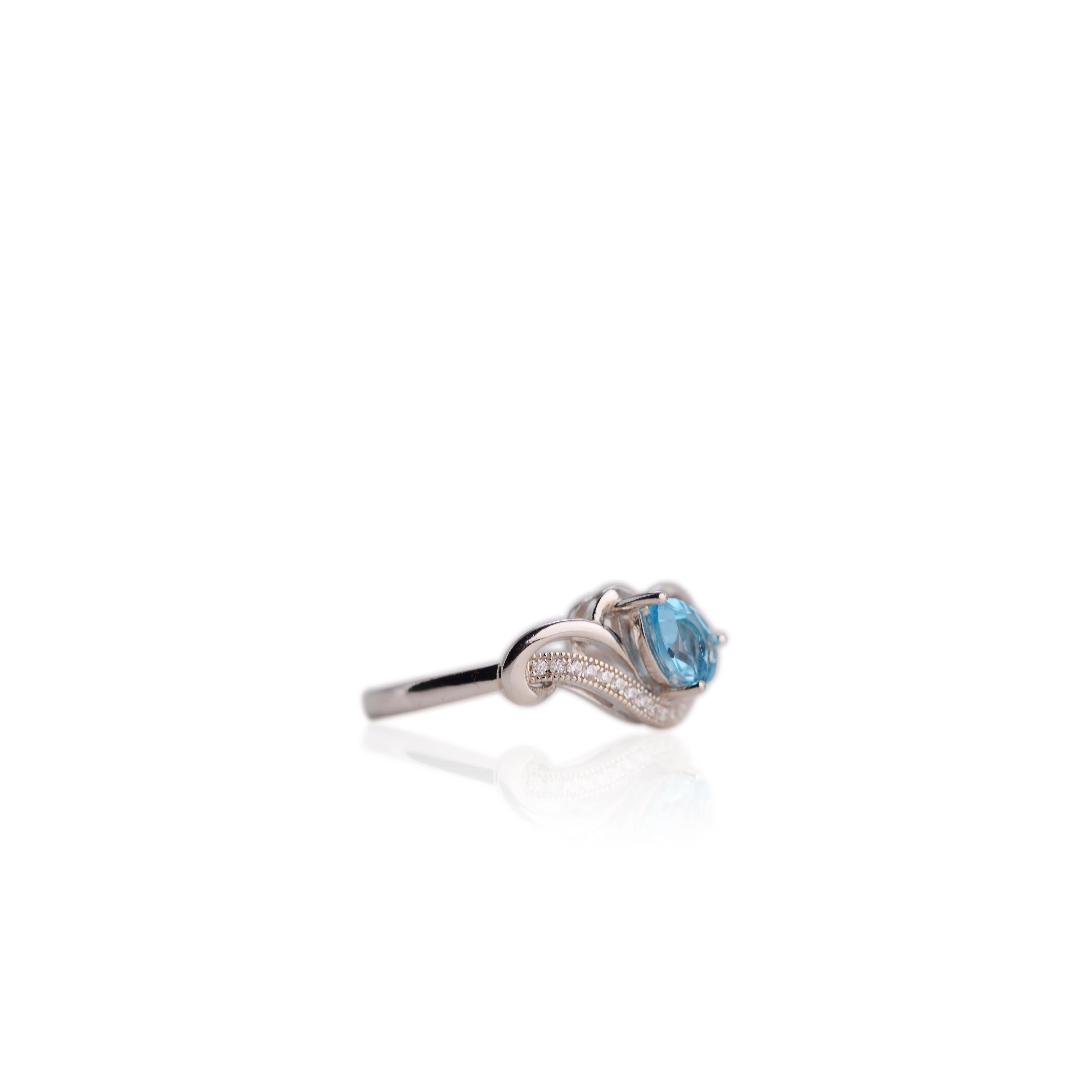 5 x 7 mm. Pear Cut Sky Blue Brazilian Topaz with Cz Accents Ring