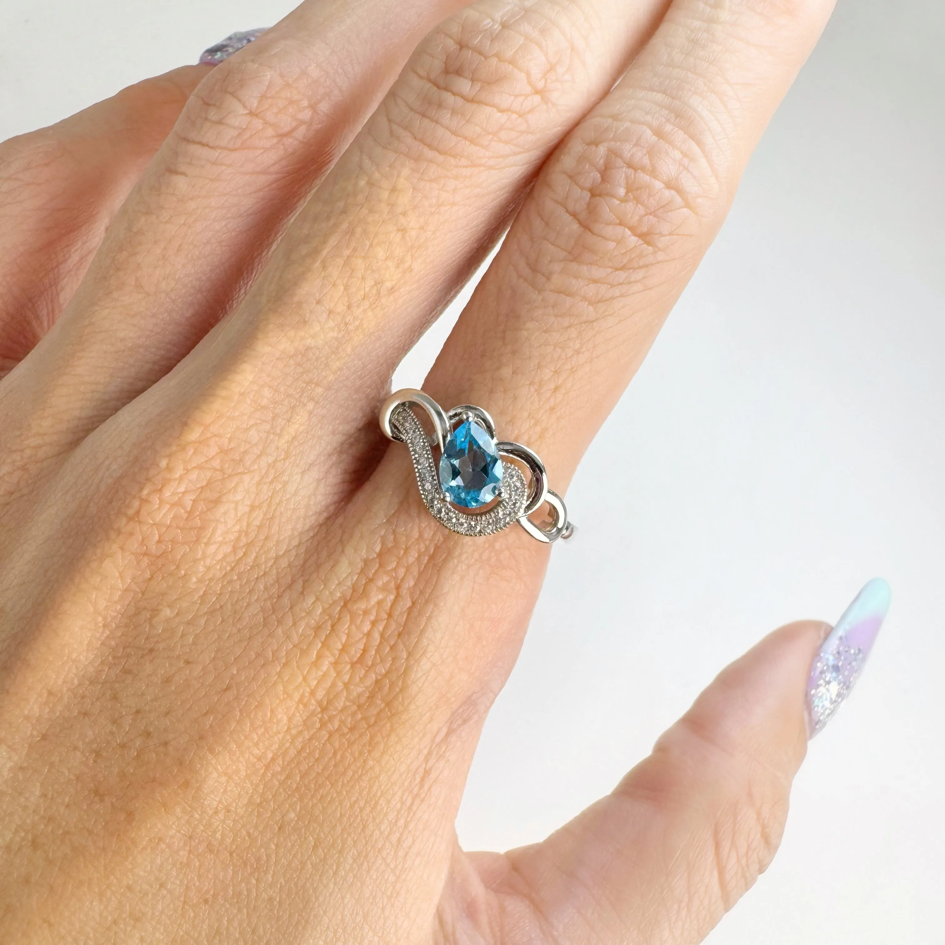 5 x 7 mm. Pear Cut Sky Blue Brazilian Topaz with Cz Accents Ring