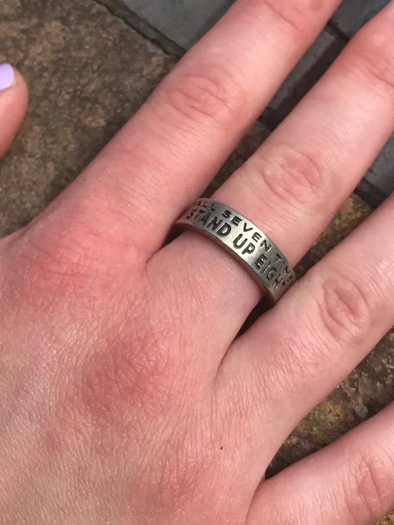 Fall Seven Times, Stand Up Eight Inspire Ring