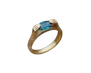 Hands with Green Sapphire Ring