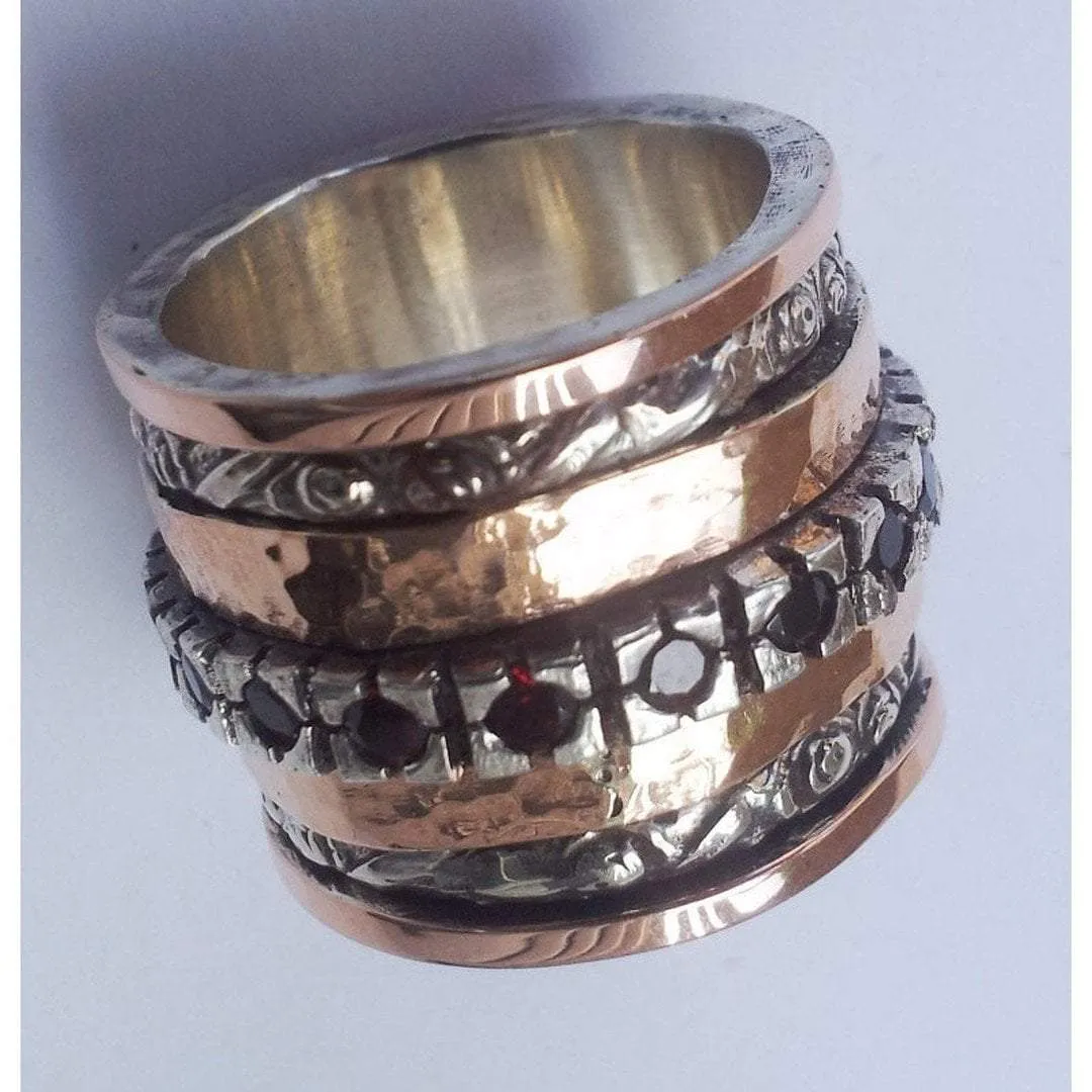 Israeli spinner ring rose gold spinner ring, 9 ct rose gold ring sterling silver, set with garnets.