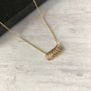 Seven Gold Rings Necklace