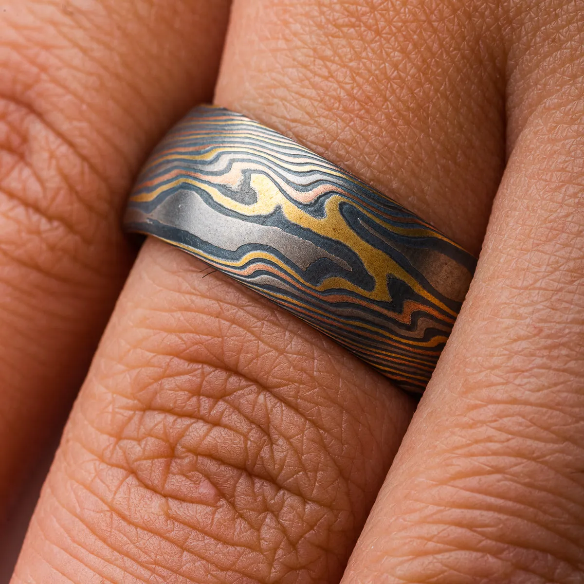 Specialty Mokume Gane Ring Set or Wedding Set in Firestorm Palette and Twist Pattern with Cathedral Set Diamond